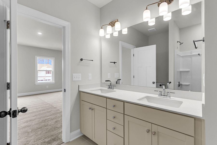 Furnished interior view inside a new home in Tidewater at Lakes of Cane Bay, Summerville (Image 11).
