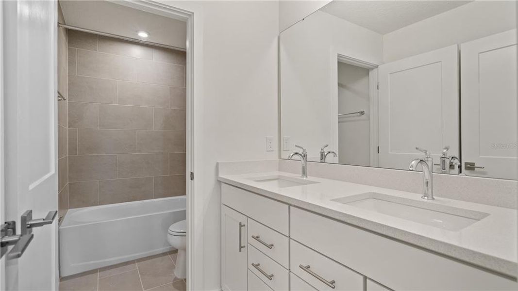 Furnished interior view inside a new home in Grasslands West, Lakeland (Image 8). Furnished interior view inside a new home in Grasslands West, Lakeland (Image 8).