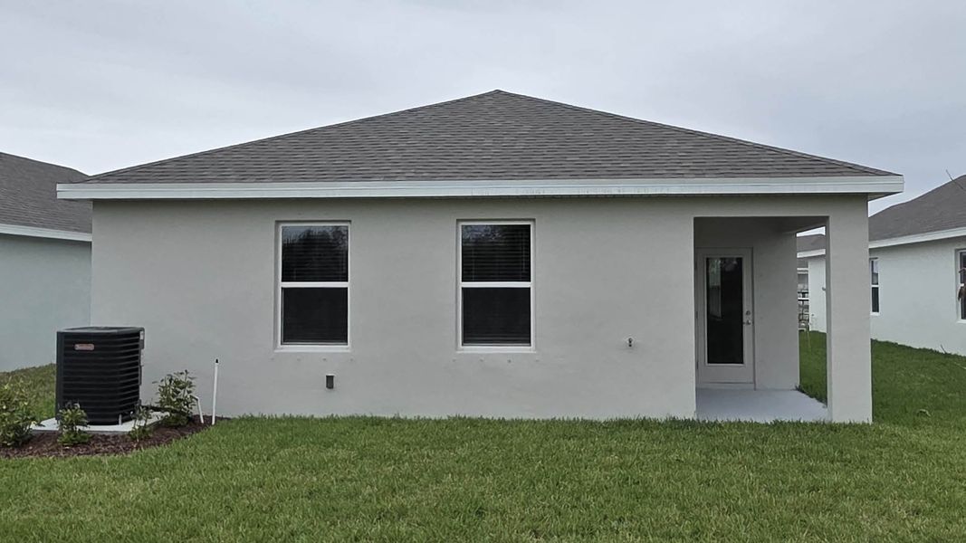 Exterior details and patio area of a home in Venetian Grove, Vero Beach (Image 2). Exterior details and patio area of a home in Venetian Grove, Vero Beach (Image 2).