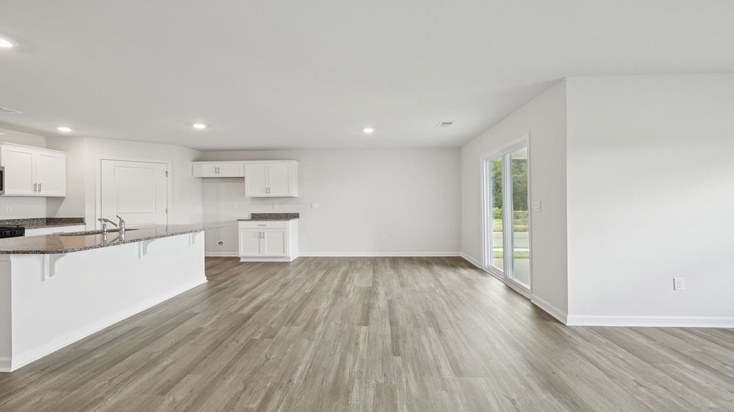 Spacious, unfurnished interior of a new home in Bentley Park, Greenwood (Image 21).
