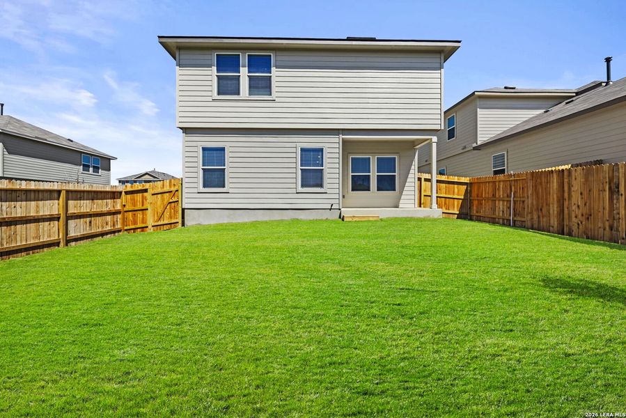 Exterior details and patio area of a home in Redbird Ranch, San Antonio (Image 3).