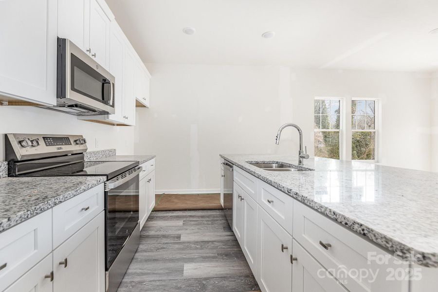 Furnished interior view inside a new home in , Statesville (Image 5).
