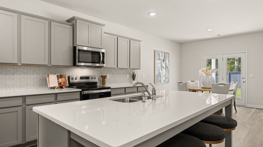 Representative furnished interior of a home built from the Halton by D.R. Horton in Jackson Landing, Jefferson (Image 16).