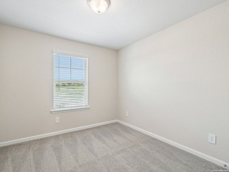 Spacious, unfurnished interior of a new home in Remington Ranch, San Antonio (Image 10).