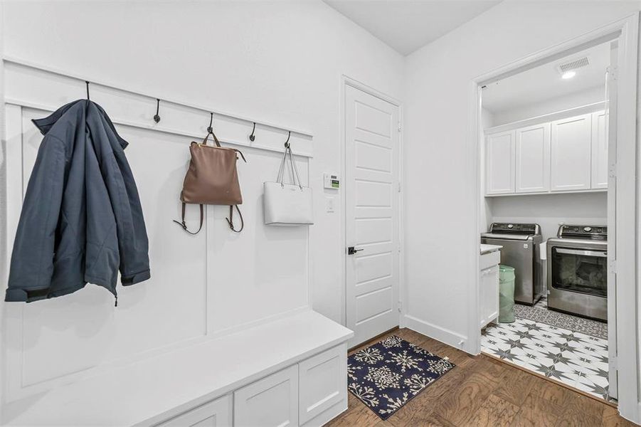 Large mud room from the 3 car garage