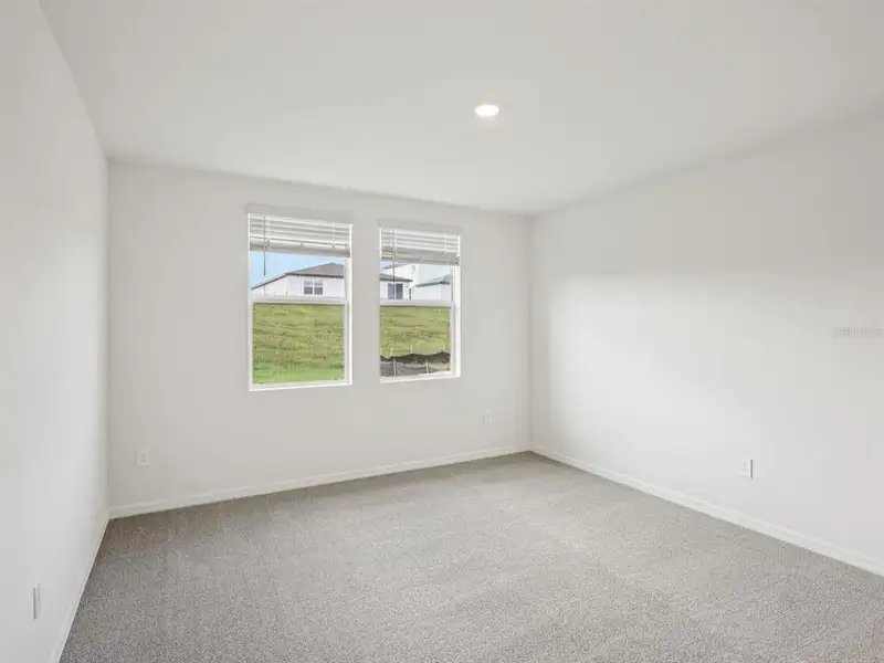 Spacious, unfurnished interior of a new home in The Reserve at Van Oaks, Auburndale (Image 20).