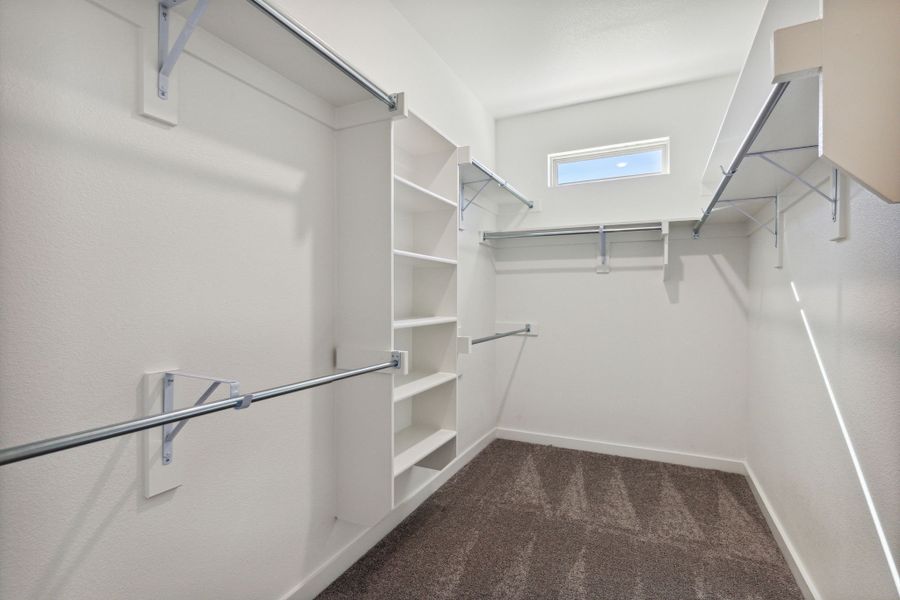 Primary Closet in the Morrison home plan by Trophy Signature Homes – REPRESENTATIVE PHOTO