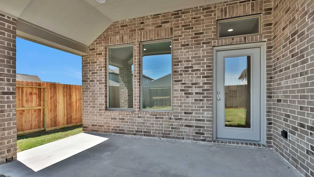 Exterior details and patio area of a home in Candela South, Richmond (Image 3).