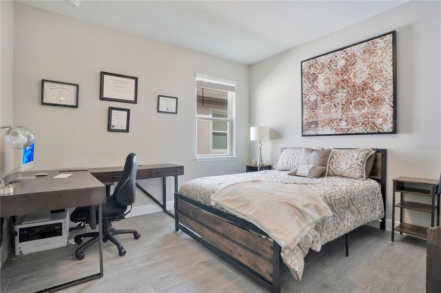 Furnished interior view inside a new home in Legends Preserve - Reserve Series, Daytona Beach (Image 17).