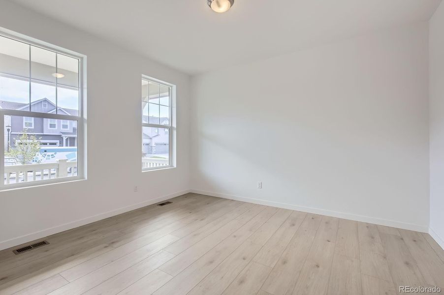 Spacious, unfurnished interior of a new home in Riano Ridge: The Monarch Collection, Loveland (Image 10).