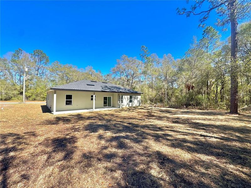 Exterior details and patio area of a home in , Citrus Springs (Image 18).