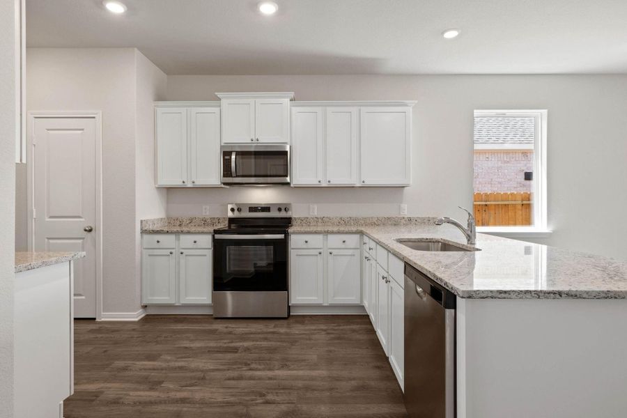 Furnished interior view inside a new home in Vacek Country Meadows, Richmond (Image 3).