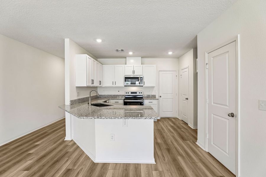 Furnished interior view inside a new home in Reserve at Forest Lake Townhomes, Lake Wales (Image 7). Furnished interior view inside a new home in Reserve at Forest Lake Townhomes, Lake Wales (Image 7).