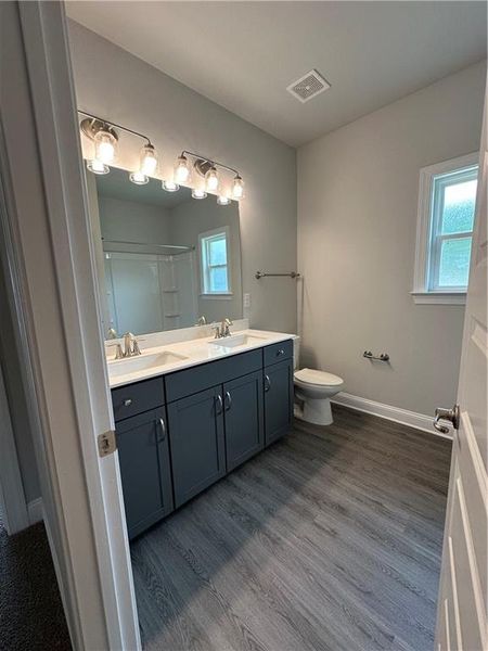 Furnished interior view inside a new home in Mirror Lake at South Harbour, Villa Rica (Image 8).
