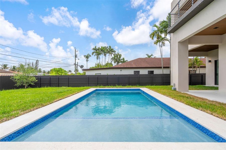 Exterior details and patio area of a home in , Miami (Image 24). Exterior details and patio area of a home in , Miami (Image 24).