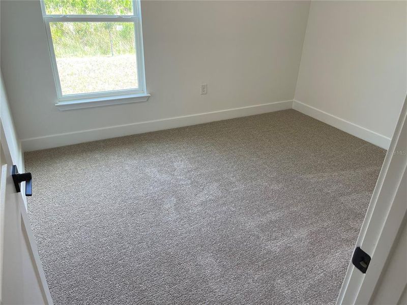 Spacious, unfurnished interior of a new home in Harmony Central, St. Cloud (Image 21).