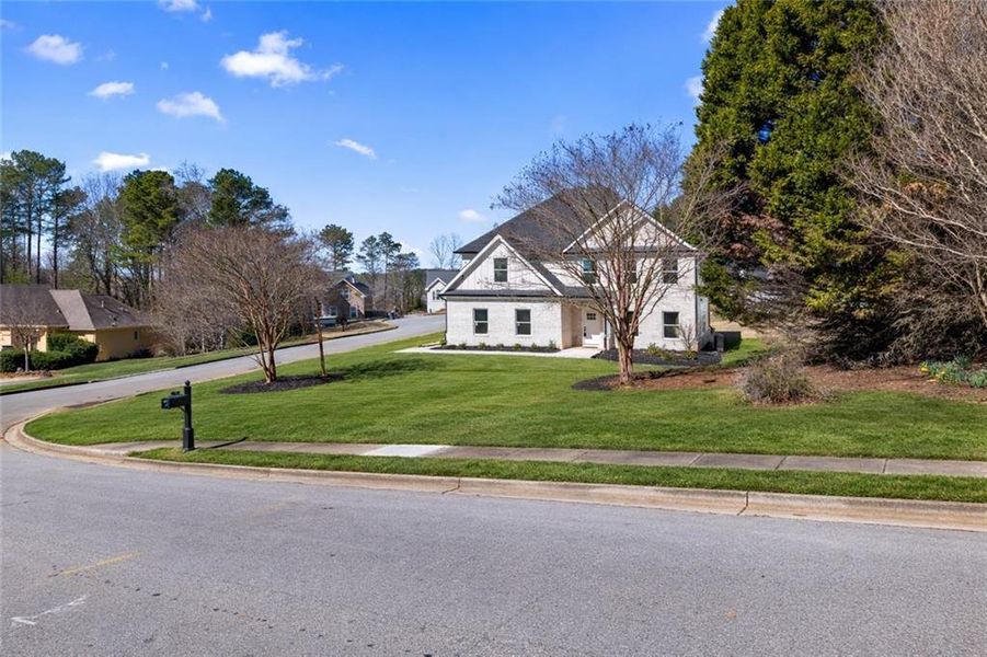 Front exterior of a new home in , Stockbridge, GA, highlighting curb appeal (Image 30). Front exterior of a new home in , Stockbridge, GA, highlighting curb appeal (Image 30).