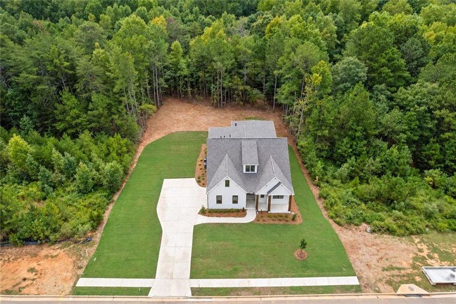 Front exterior of a new home in , Watkinsville, GA, highlighting curb appeal (Image 2). Front exterior of a new home in , Watkinsville, GA, highlighting curb appeal (Image 2).
