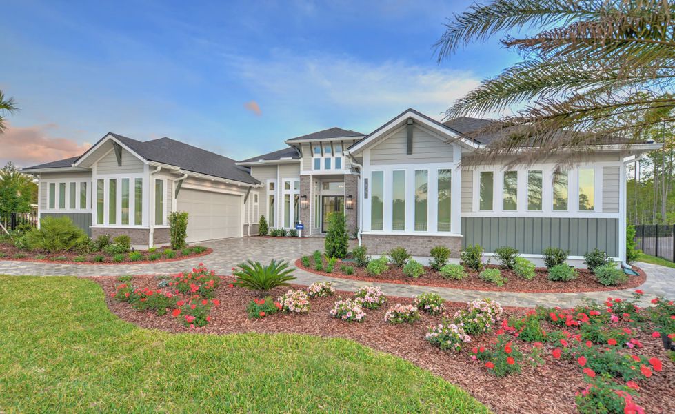 Front exterior of a new home in SilverLeaf, St. Augustine, FL, highlighting curb appeal (Image 22). Front exterior of a new home in SilverLeaf, St. Augustine, FL, highlighting curb appeal (Image 22).