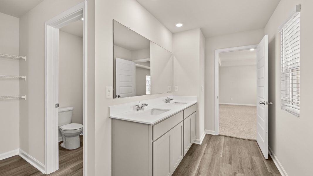 Furnished interior view inside a new home in The Reserve at Calcutta, Stockbridge (Image 9).