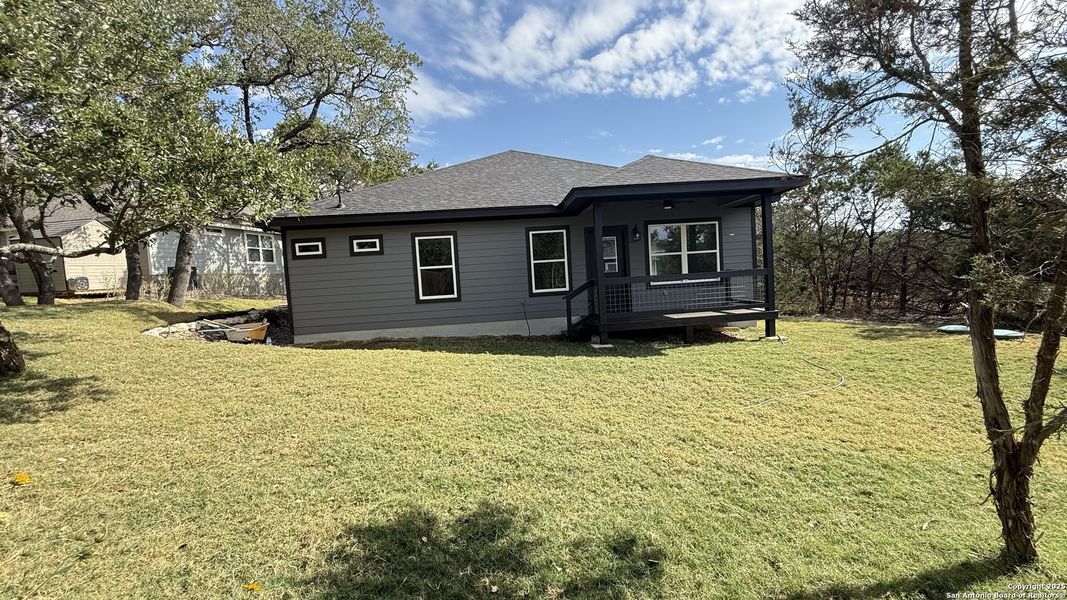 Exterior details and patio area of a home in , Spring Branch (Image 21). Exterior details and patio area of a home in , Spring Branch (Image 21).