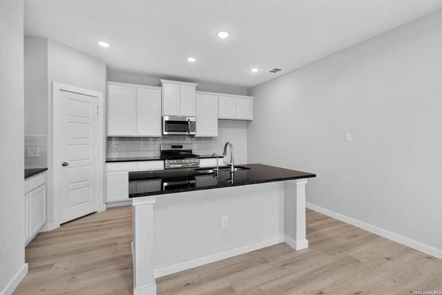 Furnished interior view inside a new home in Hickory Ridge, Elmendorf (Image 11).