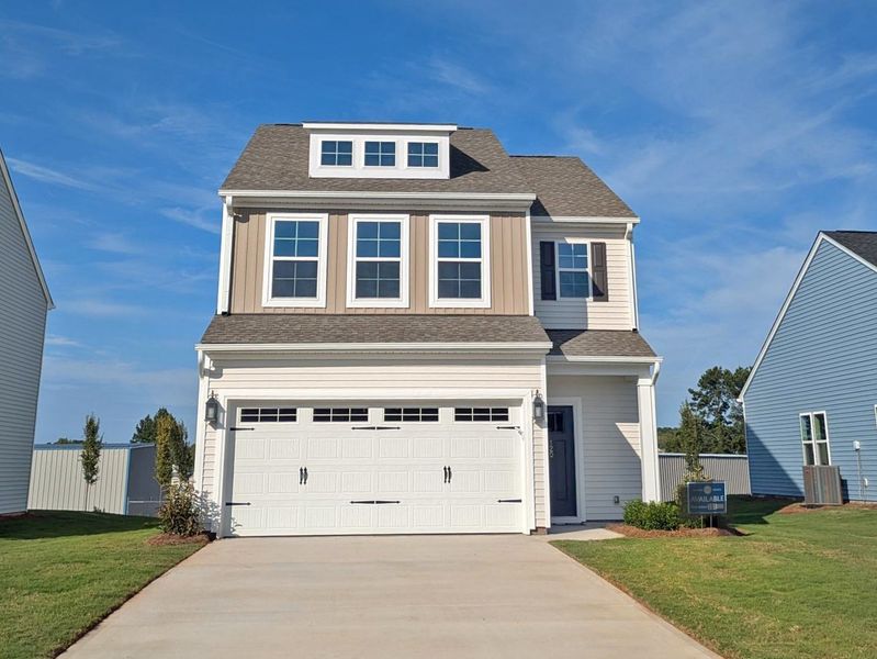 Front exterior of a new home in Tucker Ridge, Pendleton, SC, highlighting curb appeal (Image 1). Front exterior of a new home in Tucker Ridge, Pendleton, SC, highlighting curb appeal (Image 1).