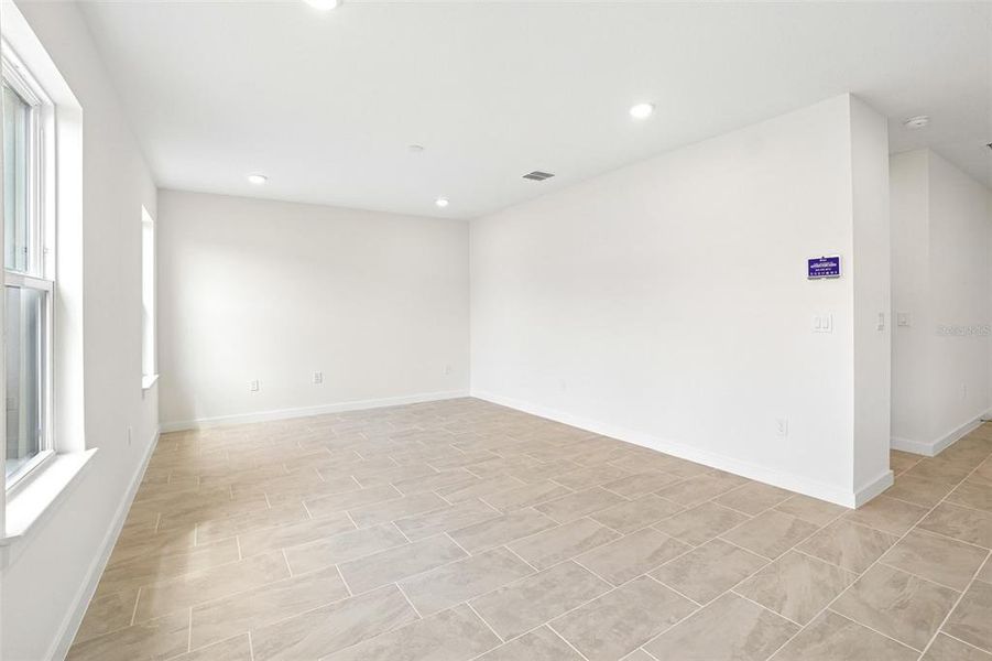 Spacious, unfurnished interior of a new home in Grasslands West, Lakeland (Image 17).