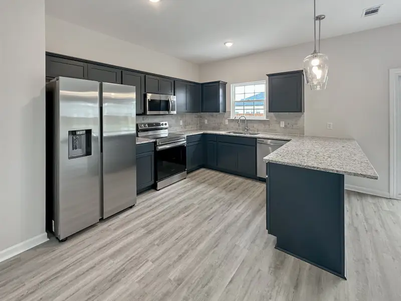 Furnished interior view inside a new home in Tranquil South, Hinesville (Image 6).