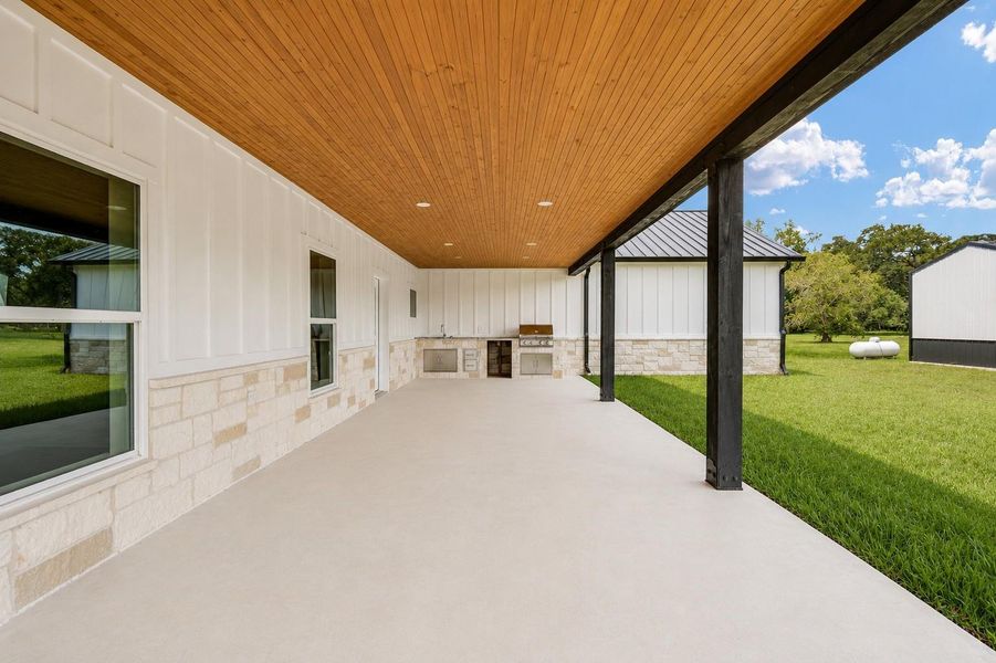 Exterior details and patio area of a home in , Angleton (Image 29).