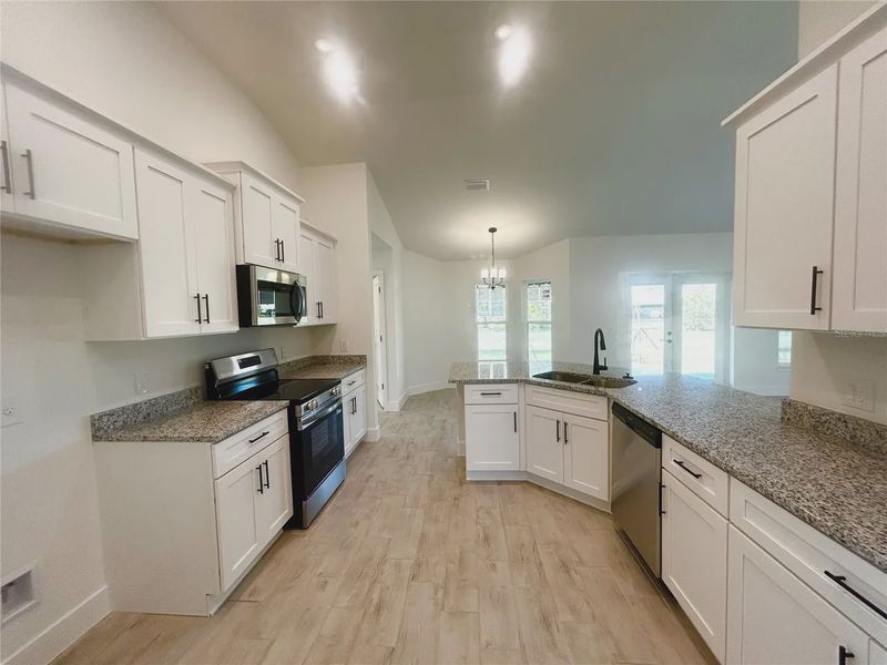 Furnished interior view inside a new home in Deep Creek, Punta Gorda (Image 5).