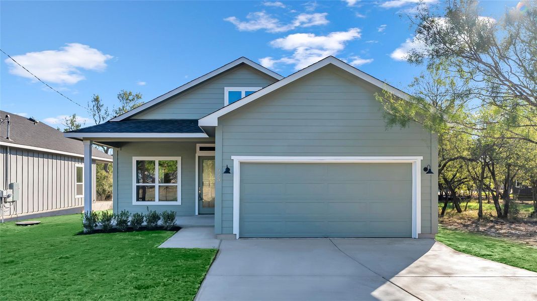 Front exterior of a new home in , Cottonwood Shores, TX, highlighting curb appeal (Image 2).