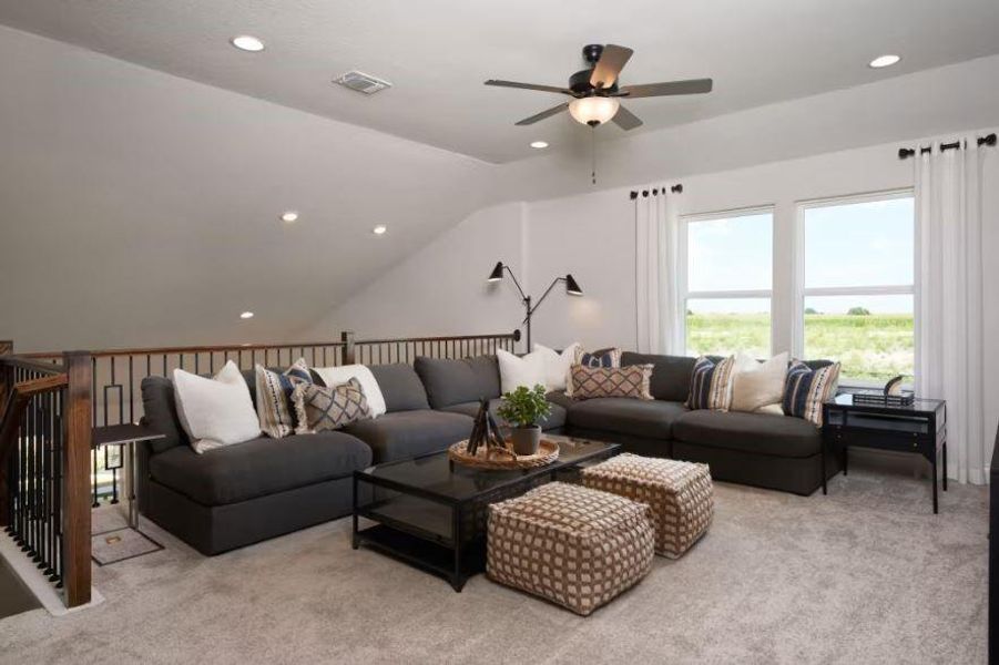 Photo of Pulte model home with same floor plan, not of actual home listed.