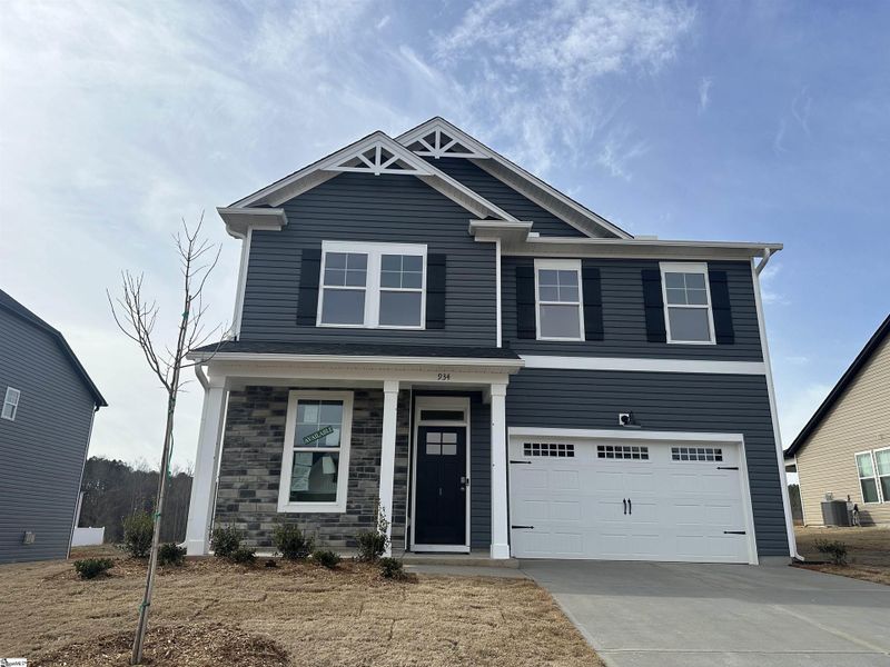Front exterior of a new home in Shiloh Trail, Wellford, SC, highlighting curb appeal (Image 2). Front exterior of a new home in Shiloh Trail, Wellford, SC, highlighting curb appeal (Image 2).