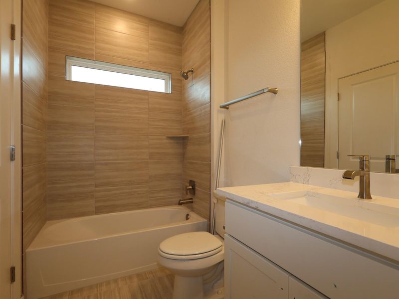 Furnished interior view inside a new home in Colony at Cole Springs, Buda (Image 7).