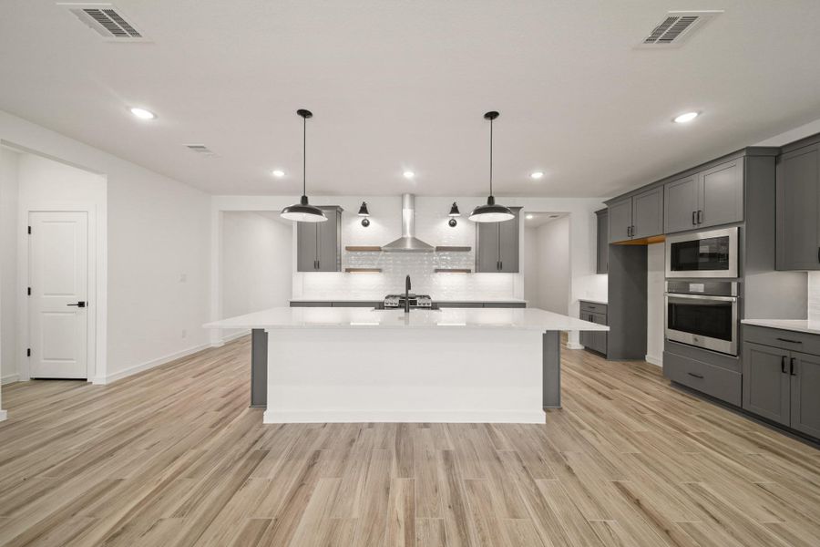 Gourmet island kitchen (*Photo not of actual home and used for illustration purposes only.)