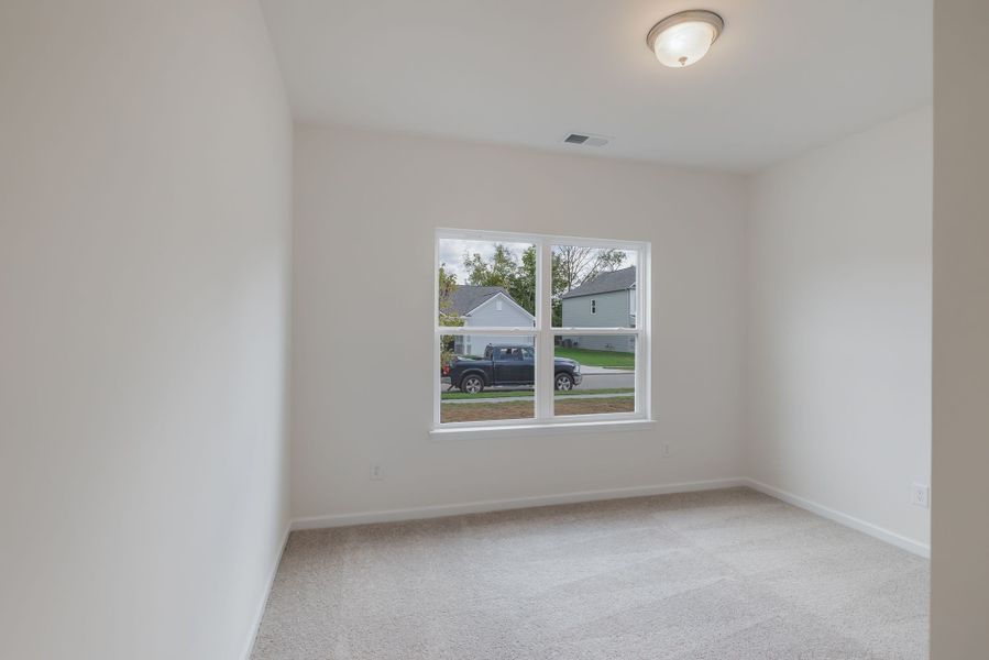 Spacious bedroom. Spacious bedroom.