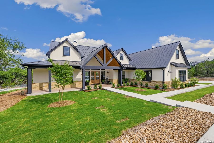 Front exterior of a new home in , New Braunfels, TX, highlighting curb appeal (Image 22).