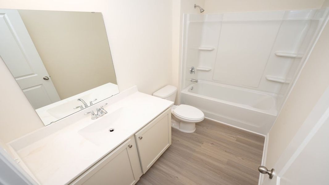 Representative furnished interior of a home built from the KERRY by D.R. Horton in The Reserve at Wild Horse, Conway (Image 6).