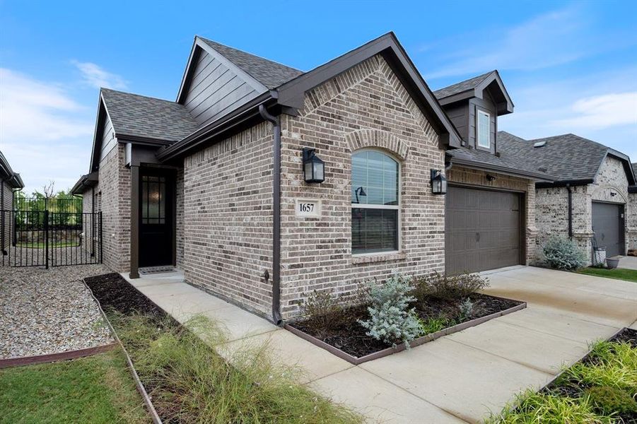 Exterior details and patio area of a home in Ladera Rockwall, Rockwall (Image 2).