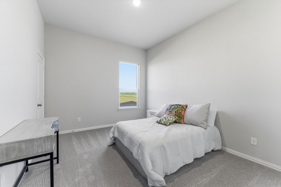 Furnished interior view inside a new home in Clear Sky Addition, Valley View (Image 18).