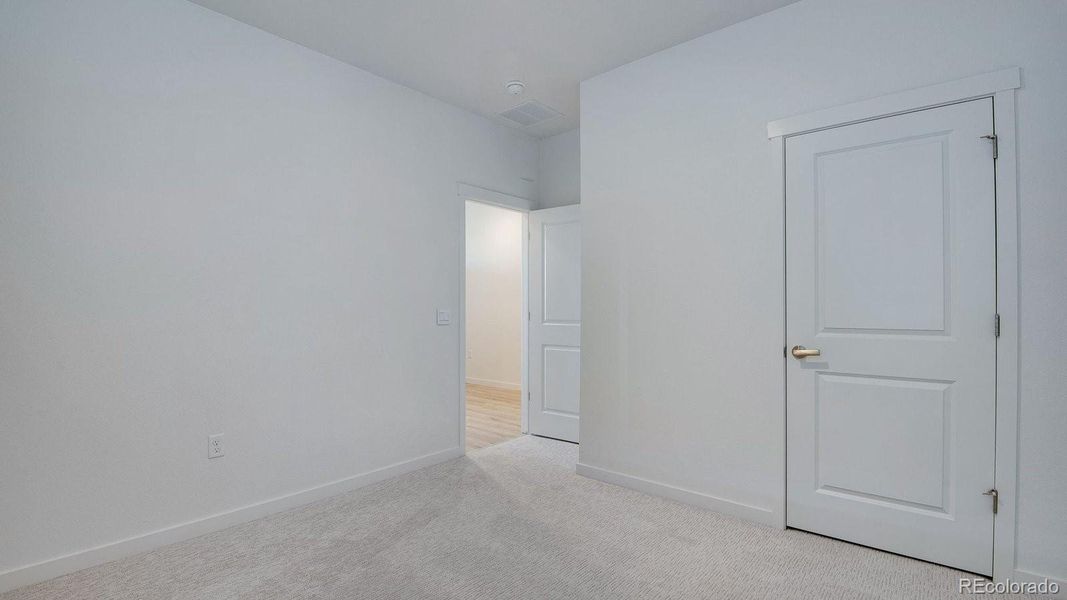 Spacious, unfurnished interior of a new home in Trails at Crowfoot, Parker (Image 27).