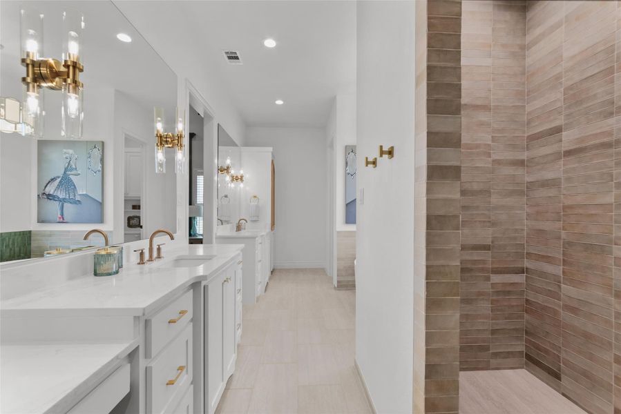 free standing tub/walk-in shower, separate vanities and gorgeous white and gold accented cabinets and fixtures. free standing tub/walk-in shower, separate vanities and gorgeous white and gold accented cabinets and fixtures.