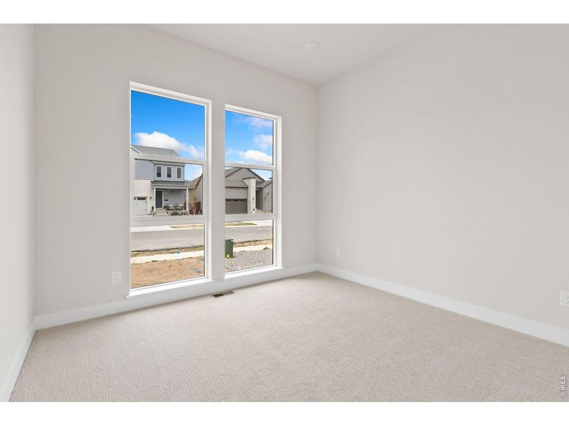 Spacious, unfurnished interior of a new home in RainDance, Windsor (Image 14).