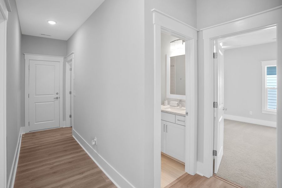 Spacious, unfurnished interior of a new home in Osprey Landing, Southport (Image 20).