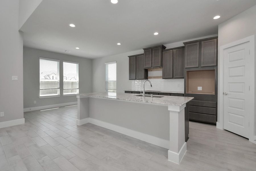 Sample photo of completed home with similar floor plan. Actual colors and selections may vary. Sample photo of completed home with similar floor plan. Actual colors and selections may vary.