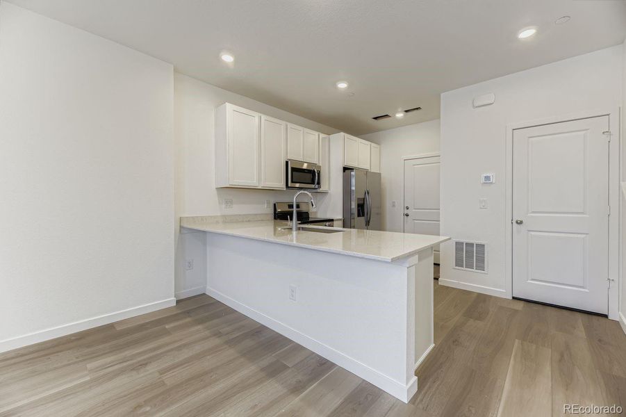 Furnished interior view inside a new home in , Centennial (Image 2). Furnished interior view inside a new home in , Centennial (Image 2).