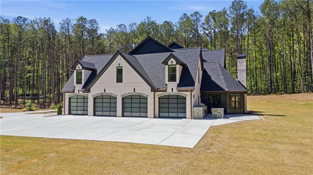 Front exterior of a new home in , Tyrone, GA, highlighting curb appeal (Image 31).
