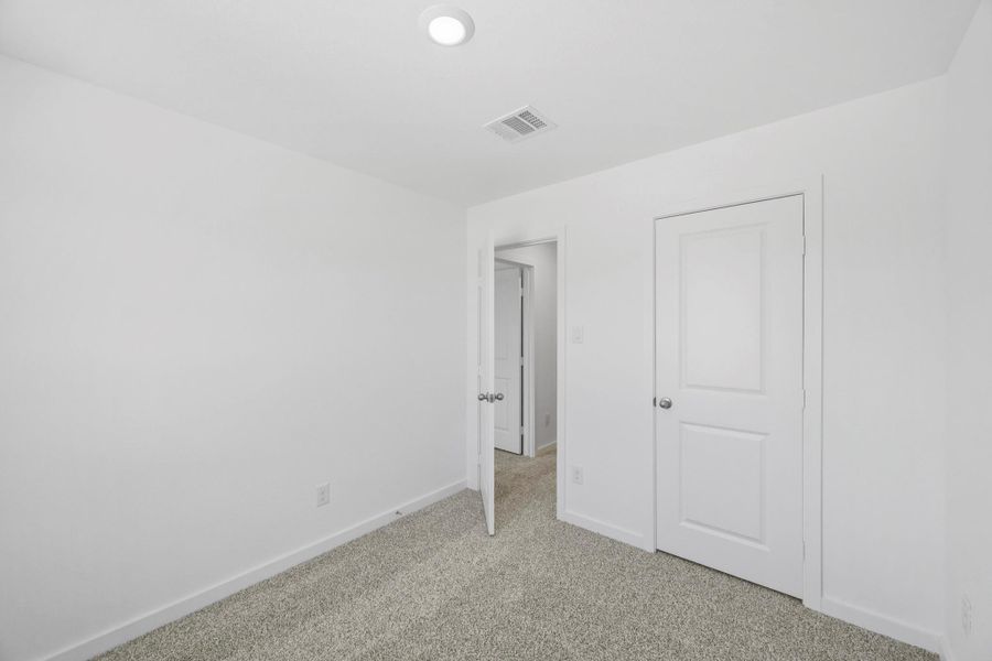 Spacious, unfurnished interior of a new home in Baron Village, Conroe (Image 14). Spacious, unfurnished interior of a new home in Baron Village, Conroe (Image 14).