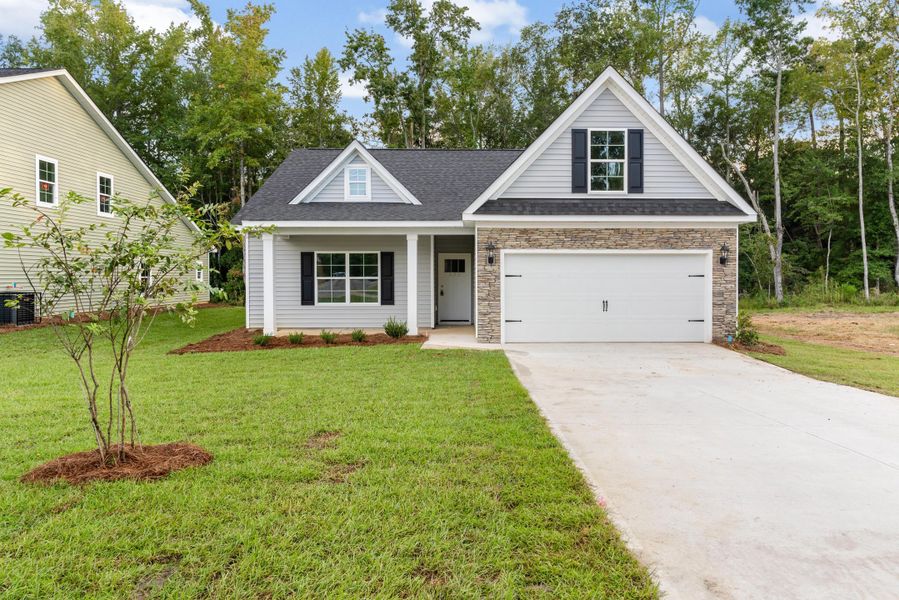 Front exterior of a new home in , Orangeburg, SC, highlighting curb appeal (Image 1).